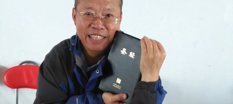 Brother-holding-Bible-feature-image