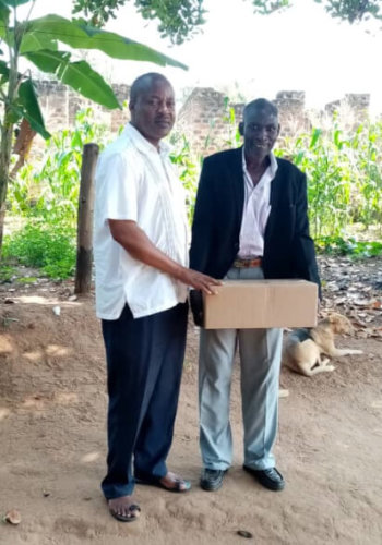 Bro Hannington Balita delivering Bibles to local pastors