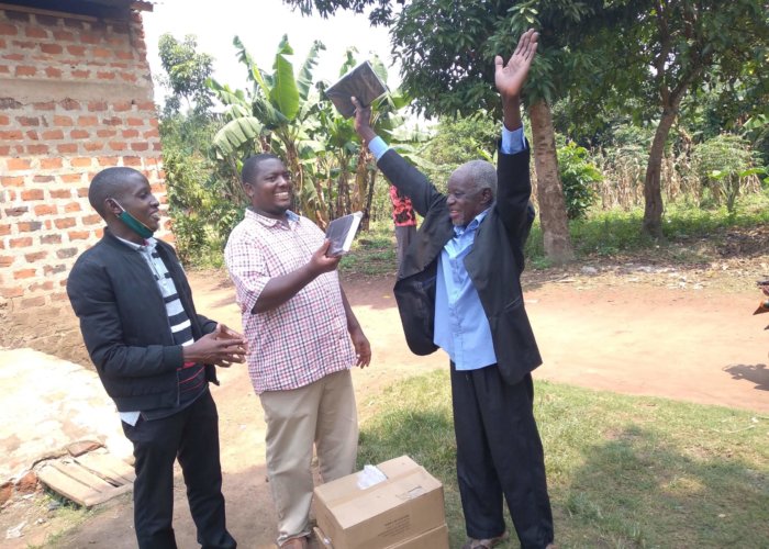 Pastor James Lugodo of Katuuko, Uganda receiving Bibles